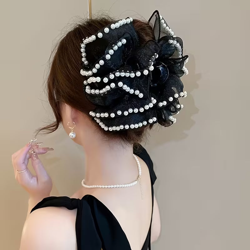A Large Bubble Grab Clip Adorned with Faux Pearl Clouds, Perfect for Adding Volume to Your Hair.