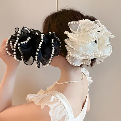 A Large Bubble Grab Clip Adorned with Faux Pearl Clouds, Perfect for Adding Volume to Your Hair.