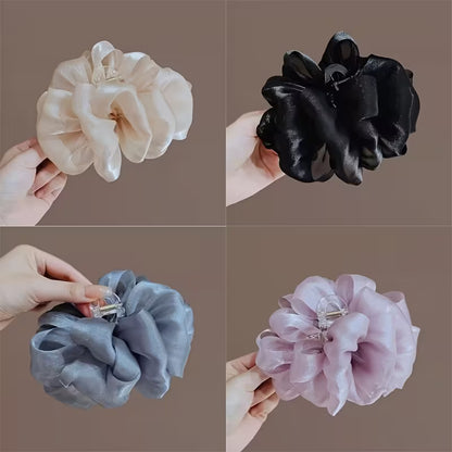 An Elegant Bubble Mesh Bow Hair Claw.