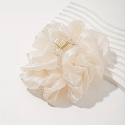 An Elegant Bubble Mesh Bow Hair Claw.
