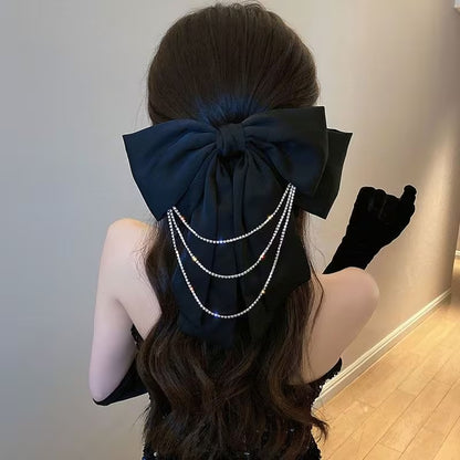 Elegant Pearl Bow Hair Clip – Luxury Statement Accessory