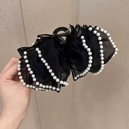 A Large Bubble Grab Clip Adorned with Faux Pearl Clouds, Perfect for Adding Volume to Your Hair.