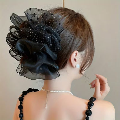 A Single Piece of Solid Color French Style Hair Claw for girls.