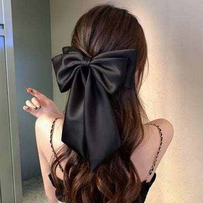 Luxurious Black Hair Clip with a Large Bow.