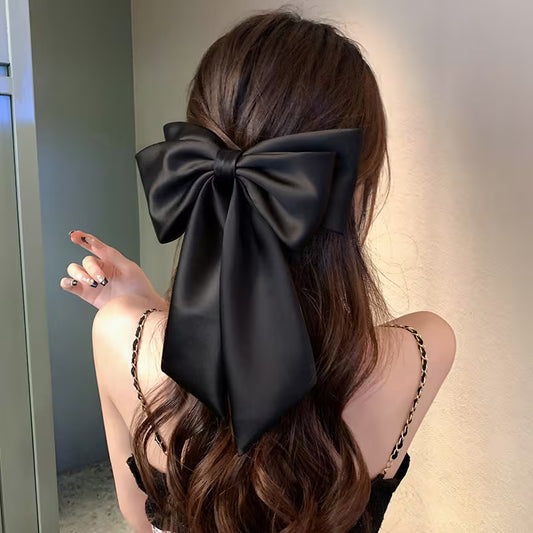Luxurious Black Hair Clip with a Large Bow.