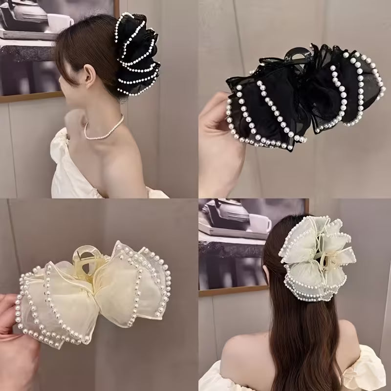 A Large Bubble Grab Clip Adorned with Faux Pearl Clouds, Perfect for Adding Volume to Your Hair.