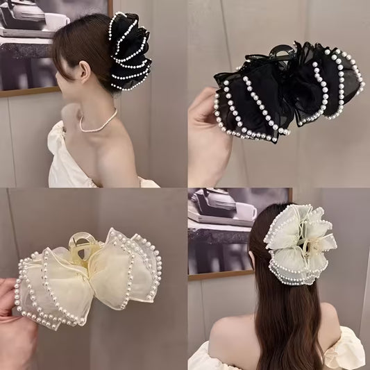 A Large Bubble Grab Clip Adorned with Faux Pearl Clouds, Perfect for Adding Volume to Your Hair.